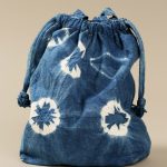 鶯／26×23㎝／布・ひも・染色